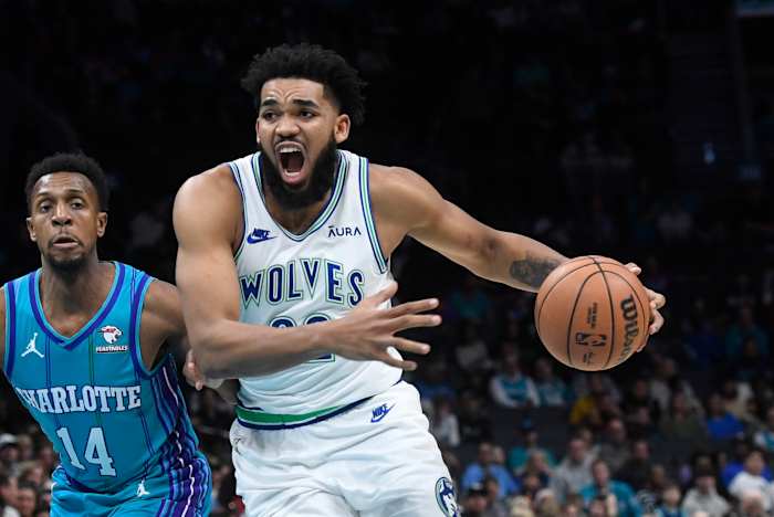 Dec 2, 2023; Charlotte, North Carolina, USA; Minnesota Timberwolves center Karl-Anthony Towns (32) drives in during the first half against the Charlotte Hornets at the Spectrum Center.